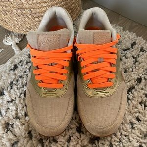 Orange and gold Nike Air Max